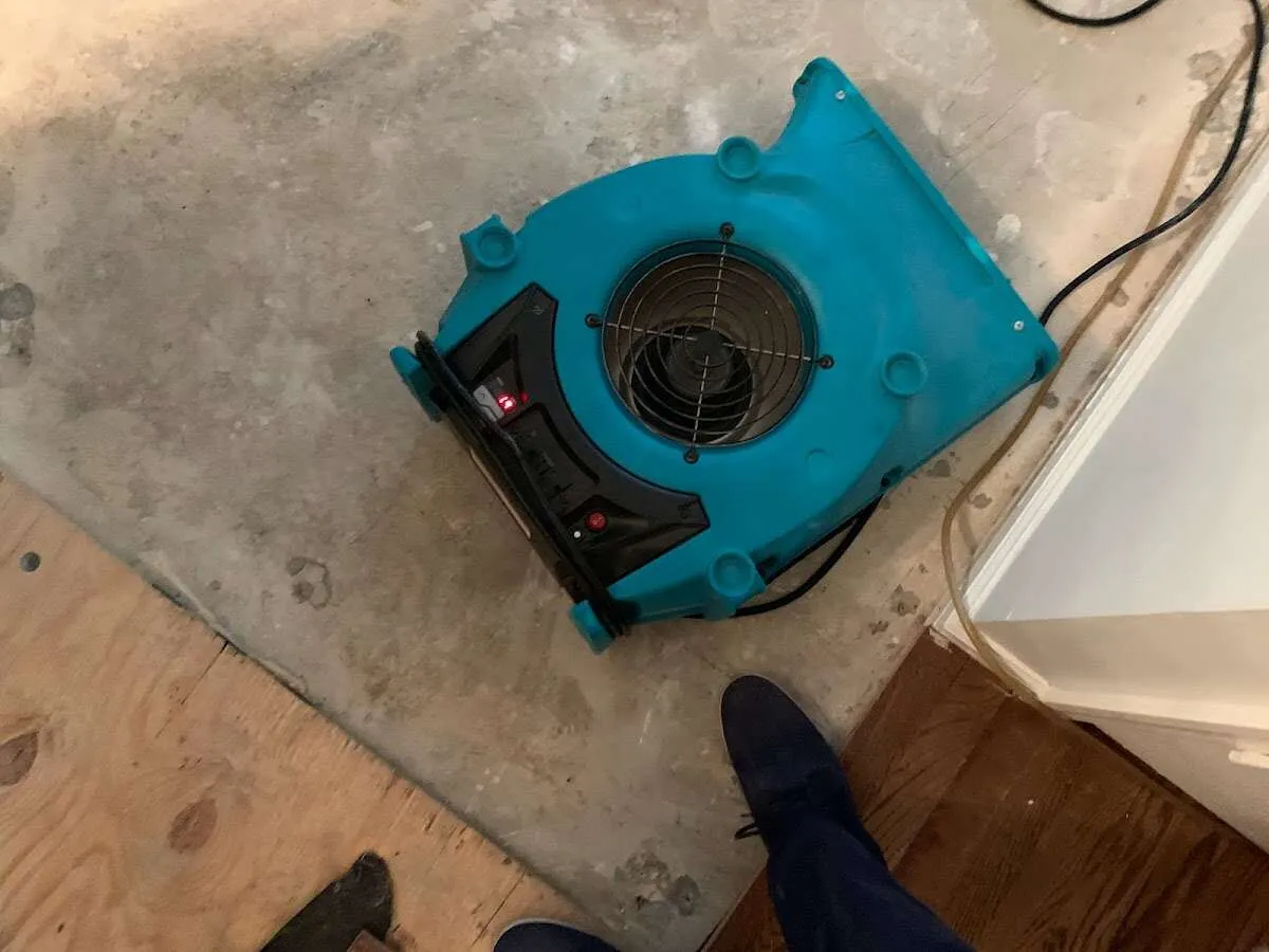 Air mover drying subfloor during Leak Detection & Repair in Pottstown